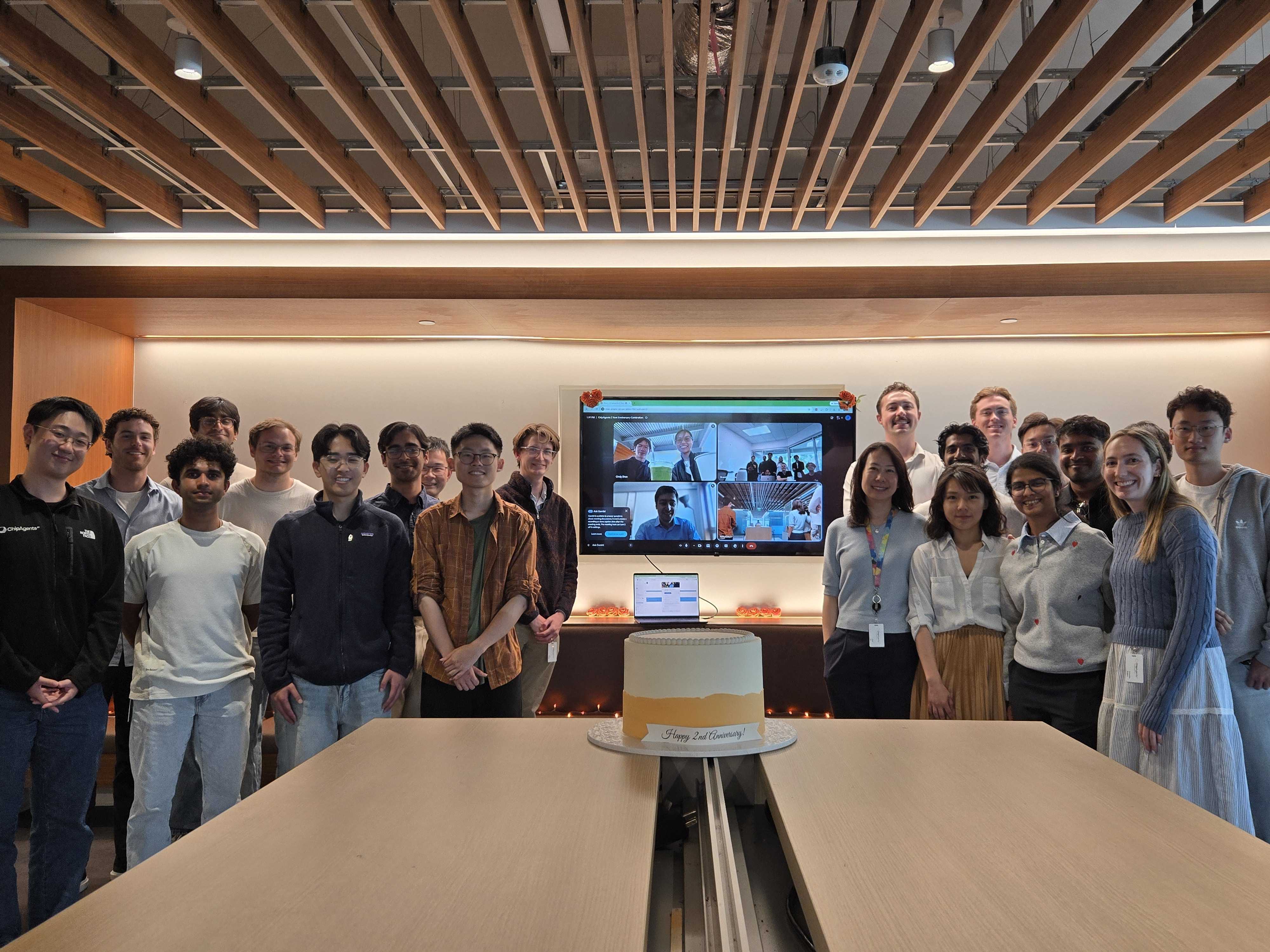 The ChipAgents team celebrating the company's two-year anniversary at the office